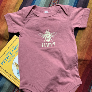 Bee happy infant onesie in mauve pink lifestyle